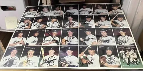 Signed baseball card collage featuring Houston Astros legends Craig Biggio and Jeff Bagwell