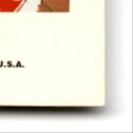 Close-up of light-colored paper with black text from Score Football Jerry Rice card