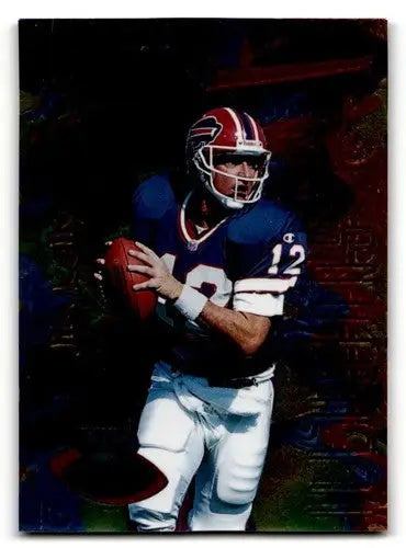 Vintage Jim Kelly Buffalo Bills football card with original gloss, featuring player in blue and white uniform holding a football