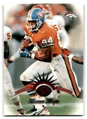 Shannon Sharpe running with the ball on a 1997 Leaf trading card