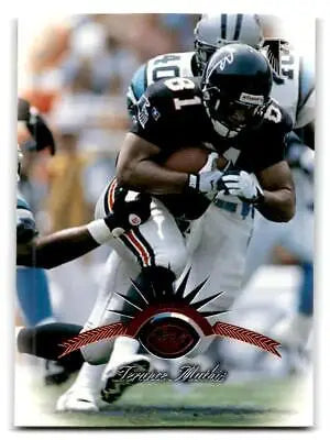 Football player in action on 1997 Leaf #44 Terance Mathis trading card
