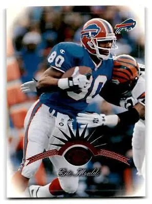 Football player in action from 1997 Leaf #78 Eric Moulds trading card