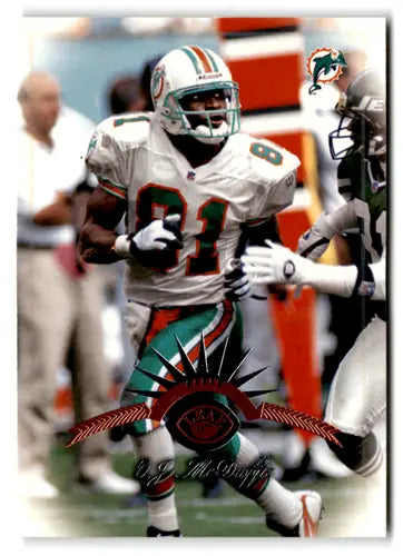 Football player in Miami Dolphins uniform with original gloss, O.J. McDuffie NM-MT Dolphins