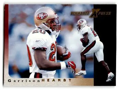 1997 Pinnacle X-Press #72 Garrison Hearst trading card showcasing football artwork