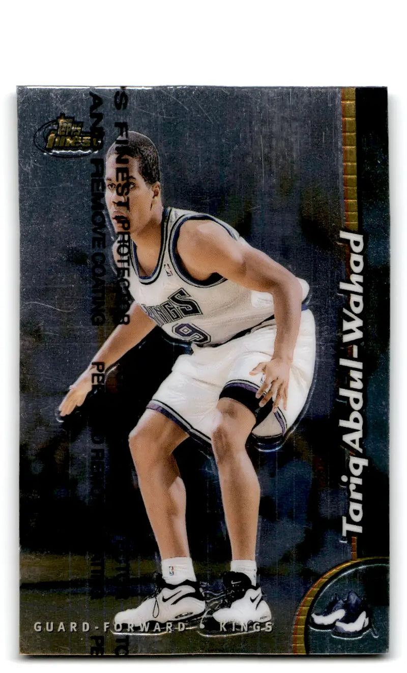 Basketball card of Tariq Abdul-Wahad from 1998-99 Finest Tariq collection with protector