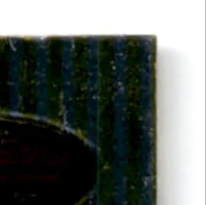 Dark green striped rectangular object with curved dark section for Bowman Baseball Eric Karros