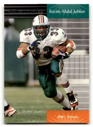 Original gloss Miami Dolphins football card featuring a football player in action