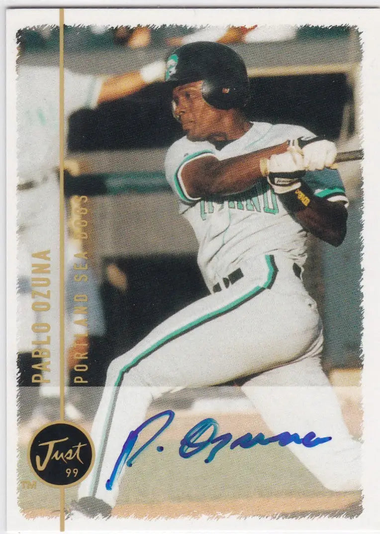 Baseball card of Minors Pablo Ozuna Auto in white and teal uniform swinging bat