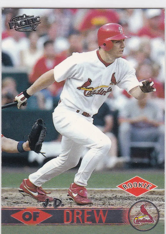Baseball player in white Cardinals uniform swinging bat for Louis Cardinals trading cards
