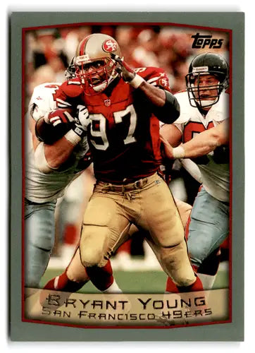 Bryant Young 1999 Topps football card with original gloss mint 49ers collectible