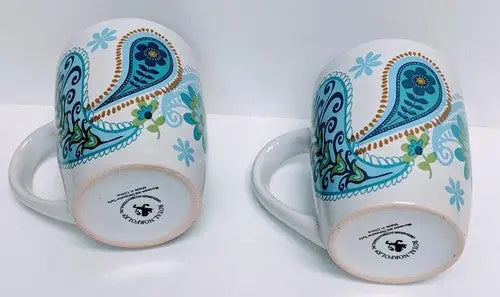 Two white ceramic mugs with Norfolk Blue Green Teal Paisley pattern for coffee or tea