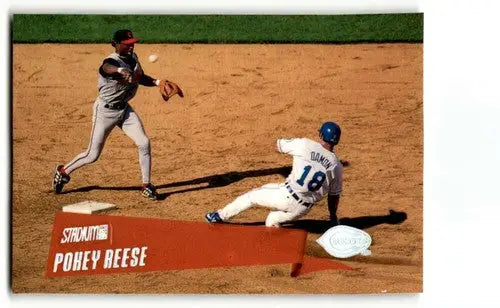 Original gloss baseball card featuring Pokey Reese Cincinnati Reds action scene