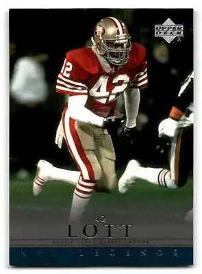 Football player in action showcasing Ronnie Lott from Upper Deck Legends series