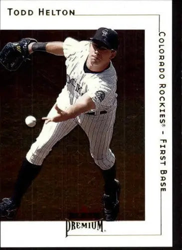 Original gloss Fleer Premium Todd Helton baseball trading card at first base