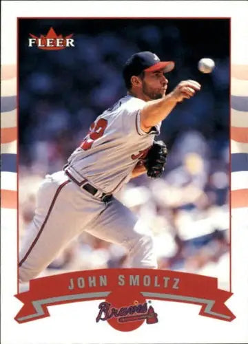 Baseball trading card featuring John Smoltz with original gloss from 2002 Fleer #323 Braves