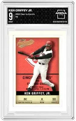 A graded Fleer Authentix Ken Griffey Jr baseball card displayed in the 2002 Fleer Authentix Ken collection