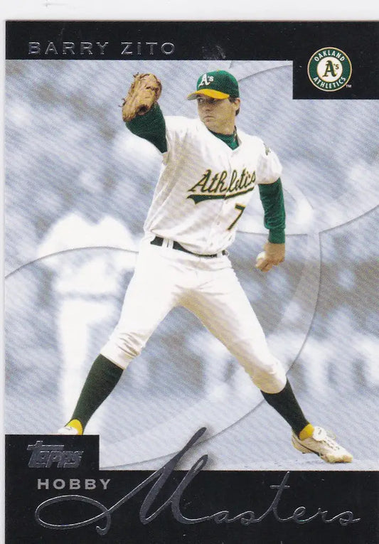 Baseball player in Oakland Athletics uniform mid-pitch on trading card 2003 Topps Barry Zito