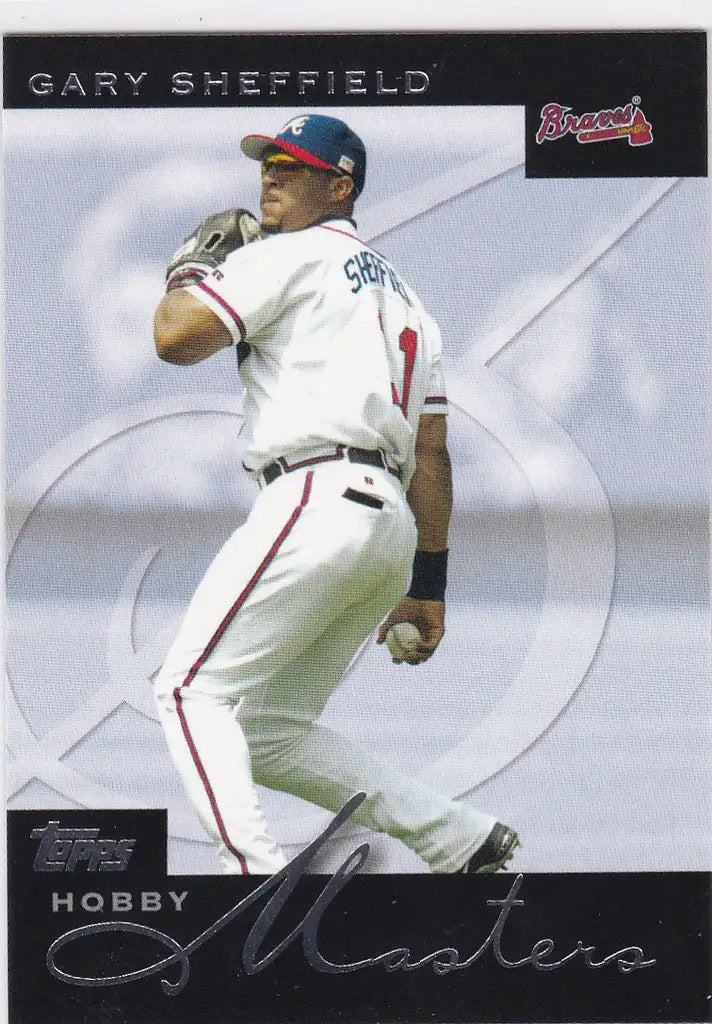 Baseball player in white and red uniform swinging bat on 2003 Topps trading card