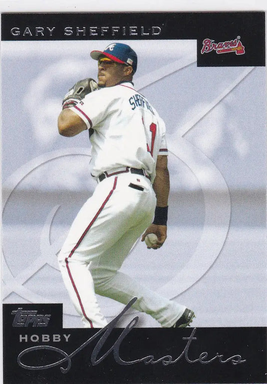 Baseball player in white and red uniform swinging bat on 2003 Topps trading card