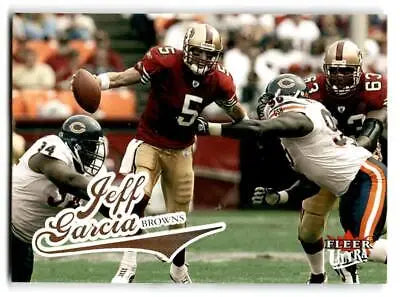 Jeff Garcia trading card showcasing a defensive player breaking through blockers