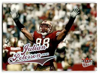 Football player in uniform on the 2004 Ultra #22 Julian Peterson trading card