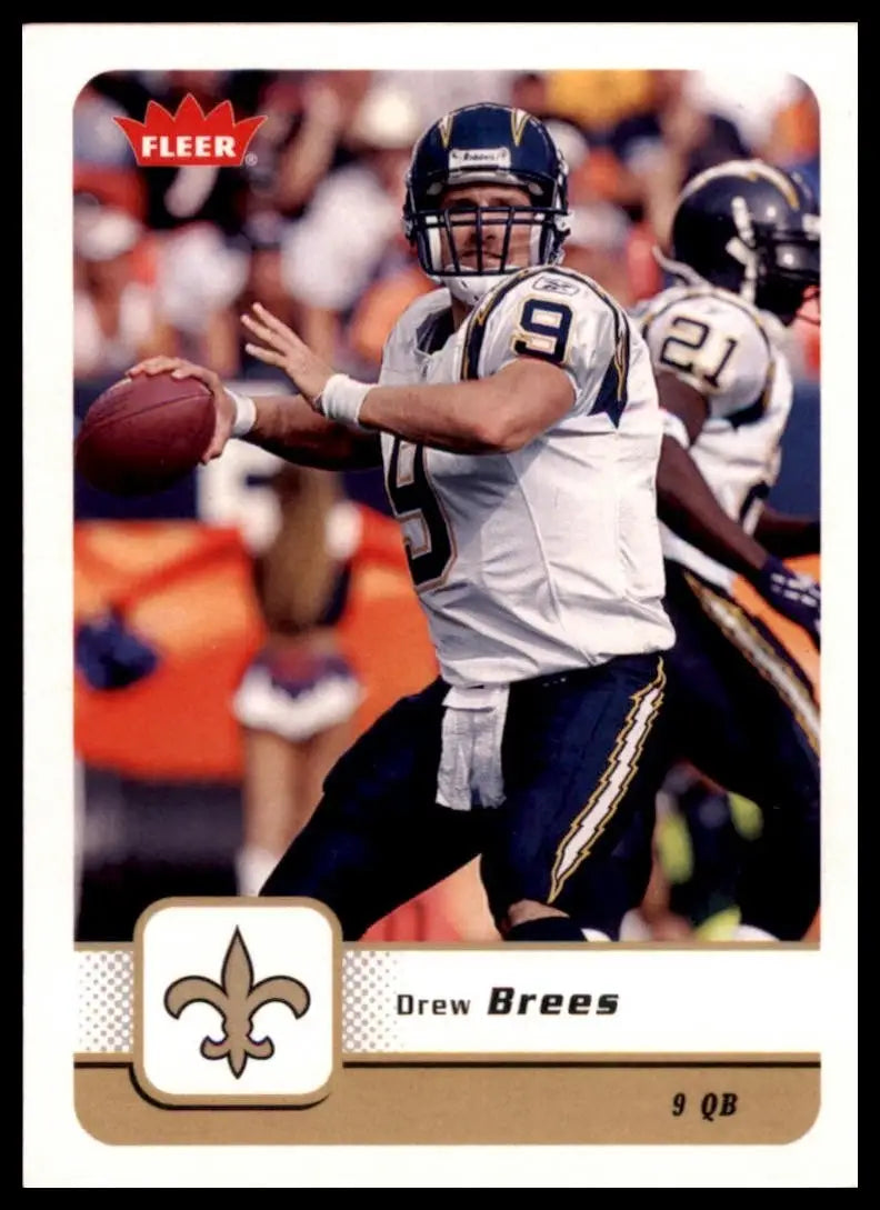 Gold fleur-de-lis football card featuring a black and white image of Drew Brees from 2006 Fleer NFL collection