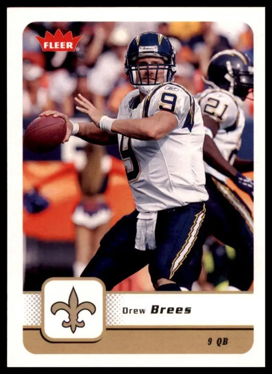 Gold fleur-de-lis football card featuring a black and white image of Drew Brees from 2006 Fleer NFL collection