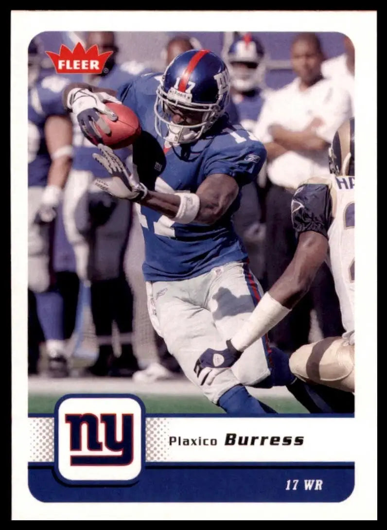 Football card featuring a blue and white football player action figure with ball in hand