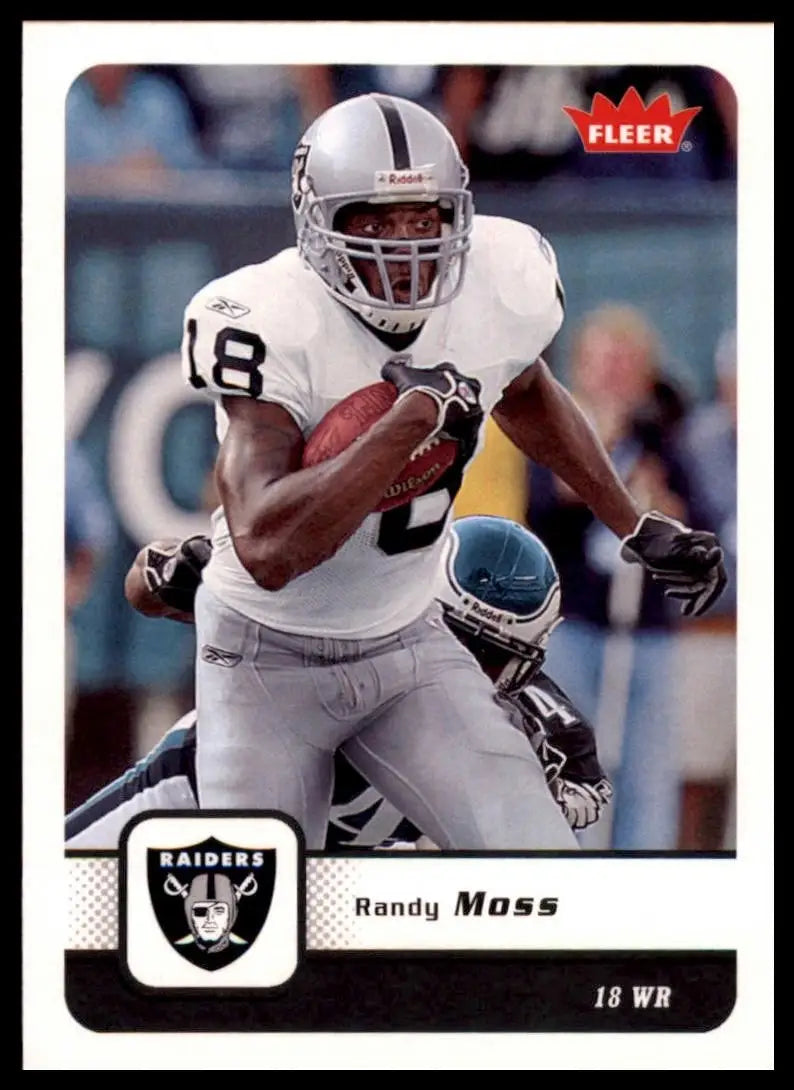 Black and silver Raiders football card featuring Randy Moss in uniform from 2006 Fleer NFL series