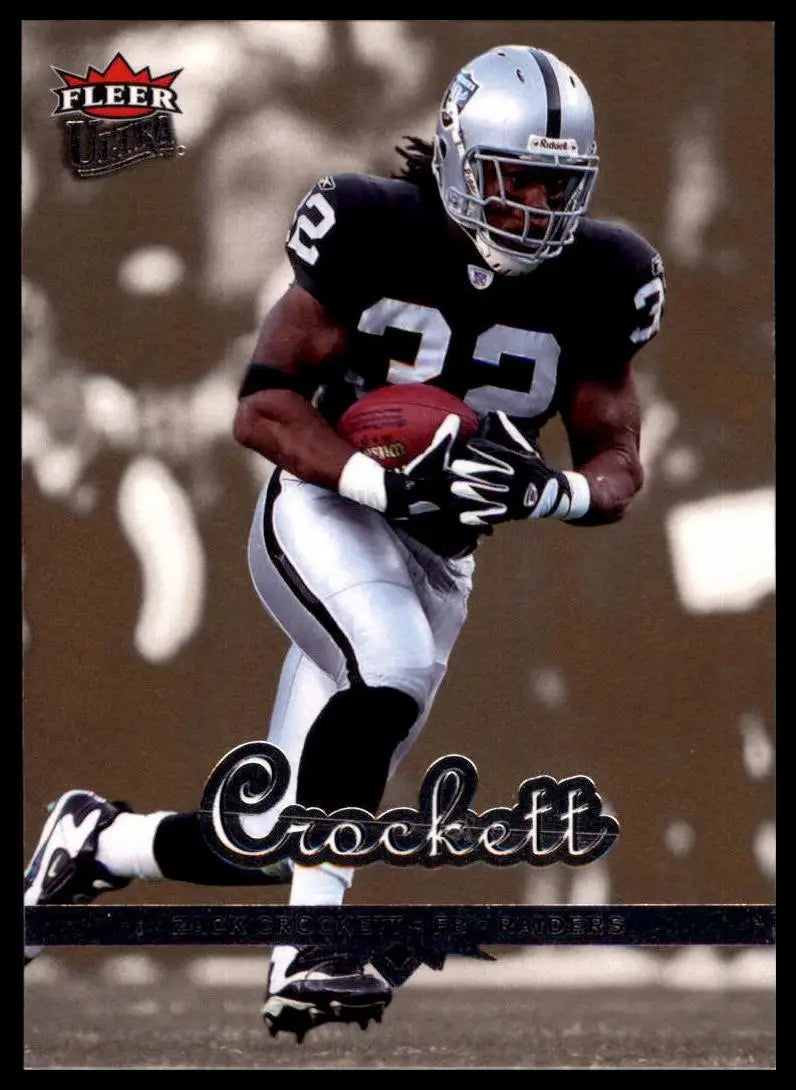 Black and white football action figure with silver helmet and number 32 jersey for football card