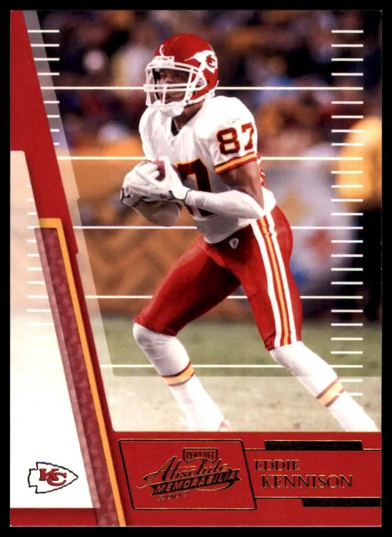 Red and white football player action figure card featuring Kansas City Chiefs logo from 2007 Playoff Absolute Memorabilia Eddie Kennison series