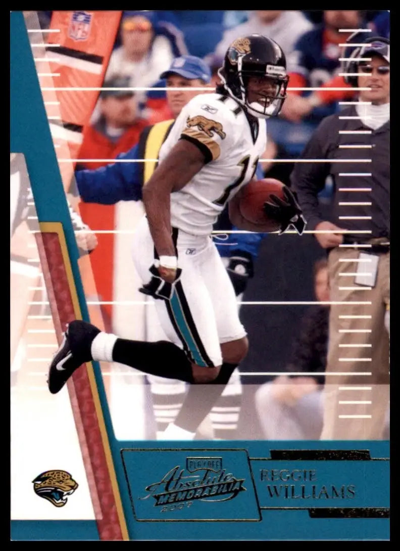 Football player action figure in black and white uniform holding a red ball from 2007 Playoff Absolute Memorabilia Reggie Williams Jacksonville Jaguars NFL