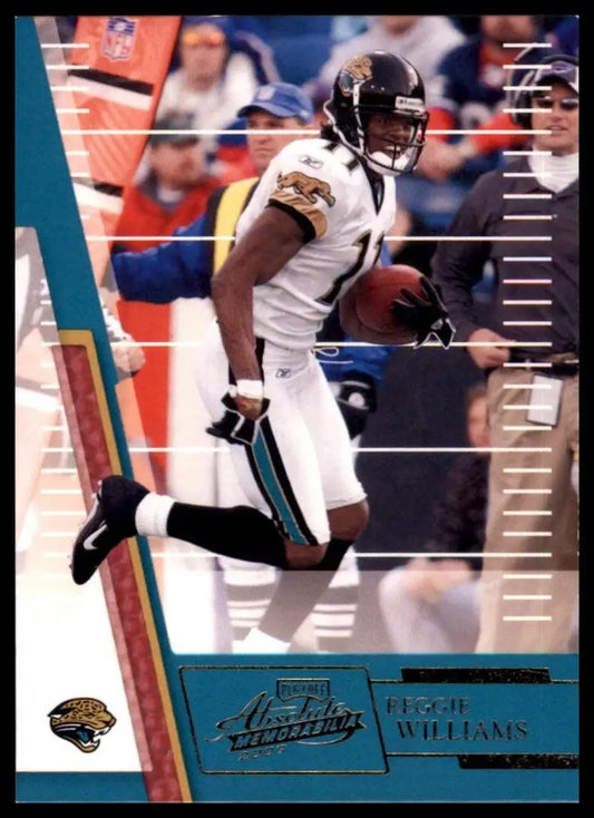 Football player action figure in black and white uniform holding a red ball from 2007 Playoff Absolute Memorabilia Reggie Williams Jacksonville Jaguars NFL