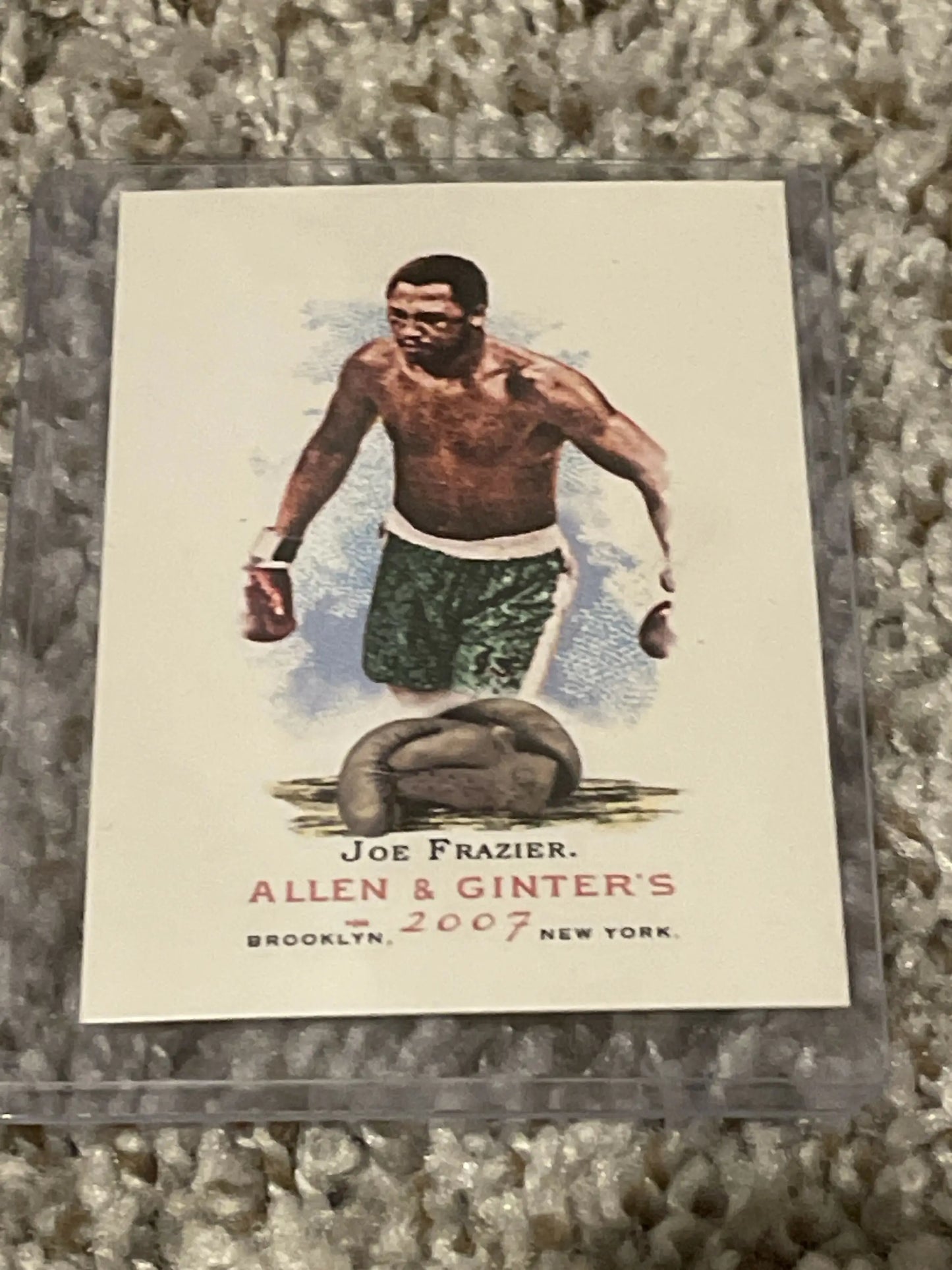 Vintage Allen & Ginter trading card of boxer Joe Frazier in green shorts
