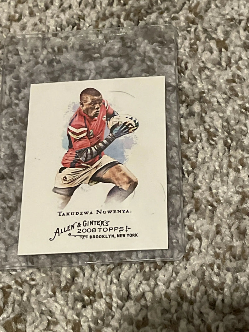 Baseball card of Takudzwa Ngwenya in red striped uniform catching a ball
