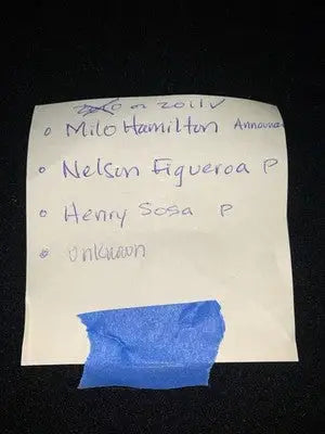 Yellow sticky note with blue tape related to Houston Astros, Milo Hamilton, and Henry Sosa baseball