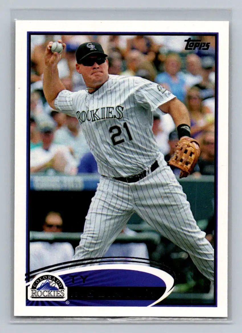 Baseball card featuring 154b Ty Wigginton of the Colorado Rockies throwing a ball
