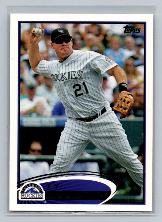 Baseball card featuring 154b Ty Wigginton of the Colorado Rockies throwing a ball