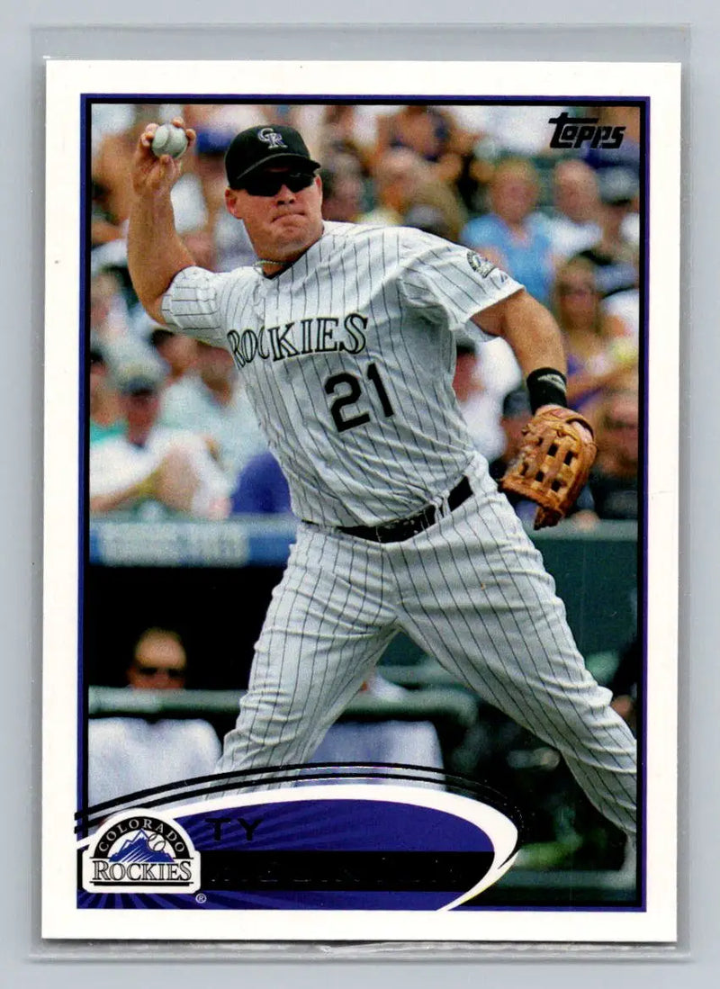 Baseball card featuring 154b Ty Wigginton of the Colorado Rockies throwing a ball