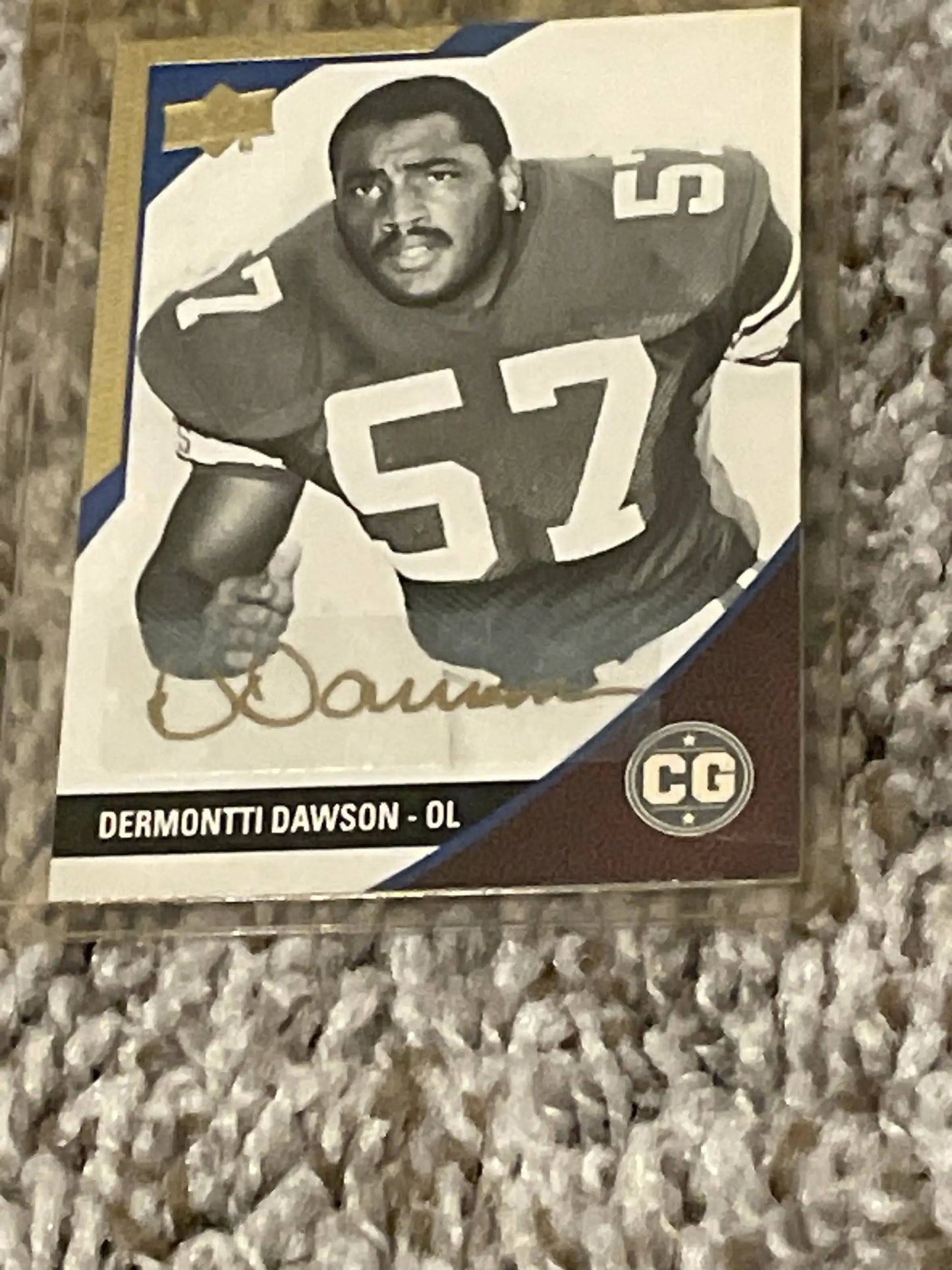 Black and white football trading card of player in jersey number 57, Dermontti Dawson