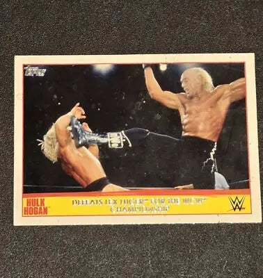 2015 Topps WWE Road to Wrestlemania #22 Defeats Lex Luger Hulk Hogan Tribute - Wrestling Card Single