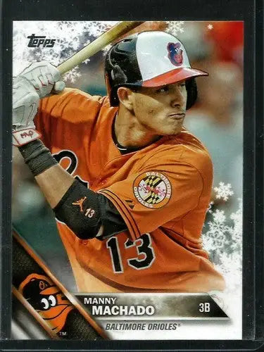 Original gloss baseball trading card of HMW24 Manny Machado in Orioles uniform from Topps Holiday