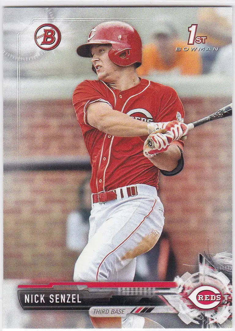 Baseball player in red Cincinnati Reds uniform swinging bat for BP1 Nick Senzel Bowman 1st