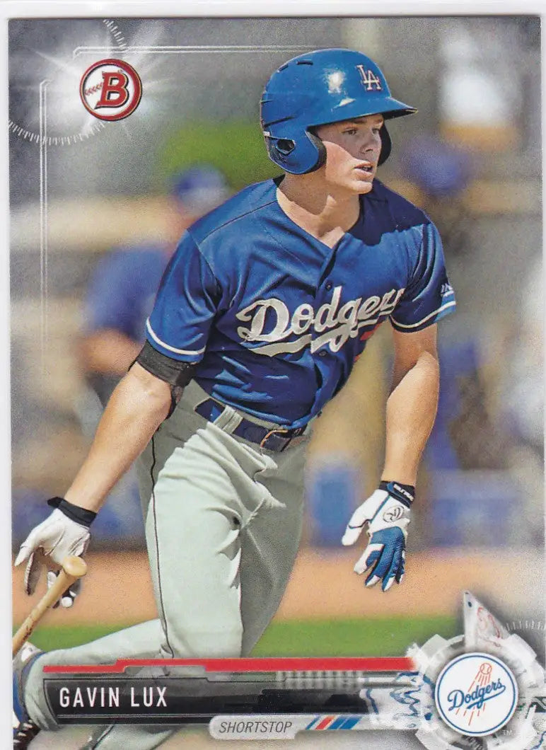Baseball player in blue Dodgers uniform, BP2 Gavin Lux, at bat for Los Angeles Dodgers