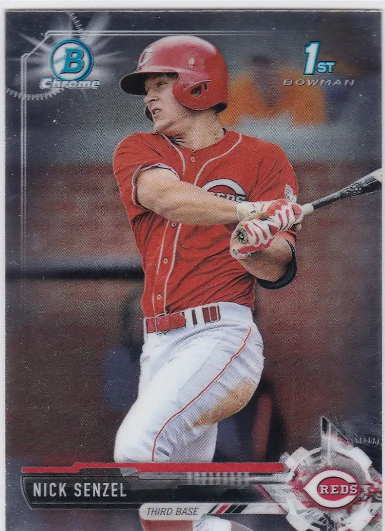 Baseball player in a red Cincinnati Reds uniform swinging bat for Bowman Chrome Nick Senzel 1st