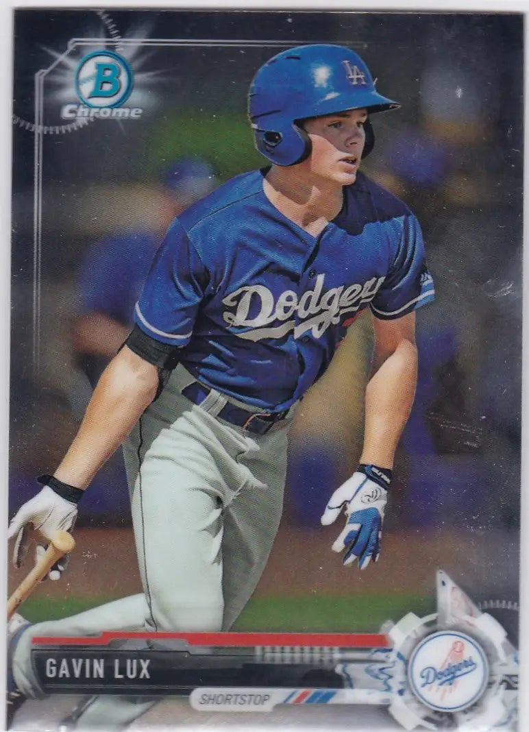 Gavin Lux in blue Dodgers uniform swinging bat for Bowman Chrome collectible card
