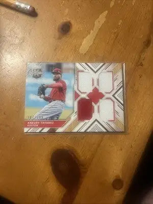Panini Elite Extra Edition baseball card with jersey swatches featuring Aneury Tavarez