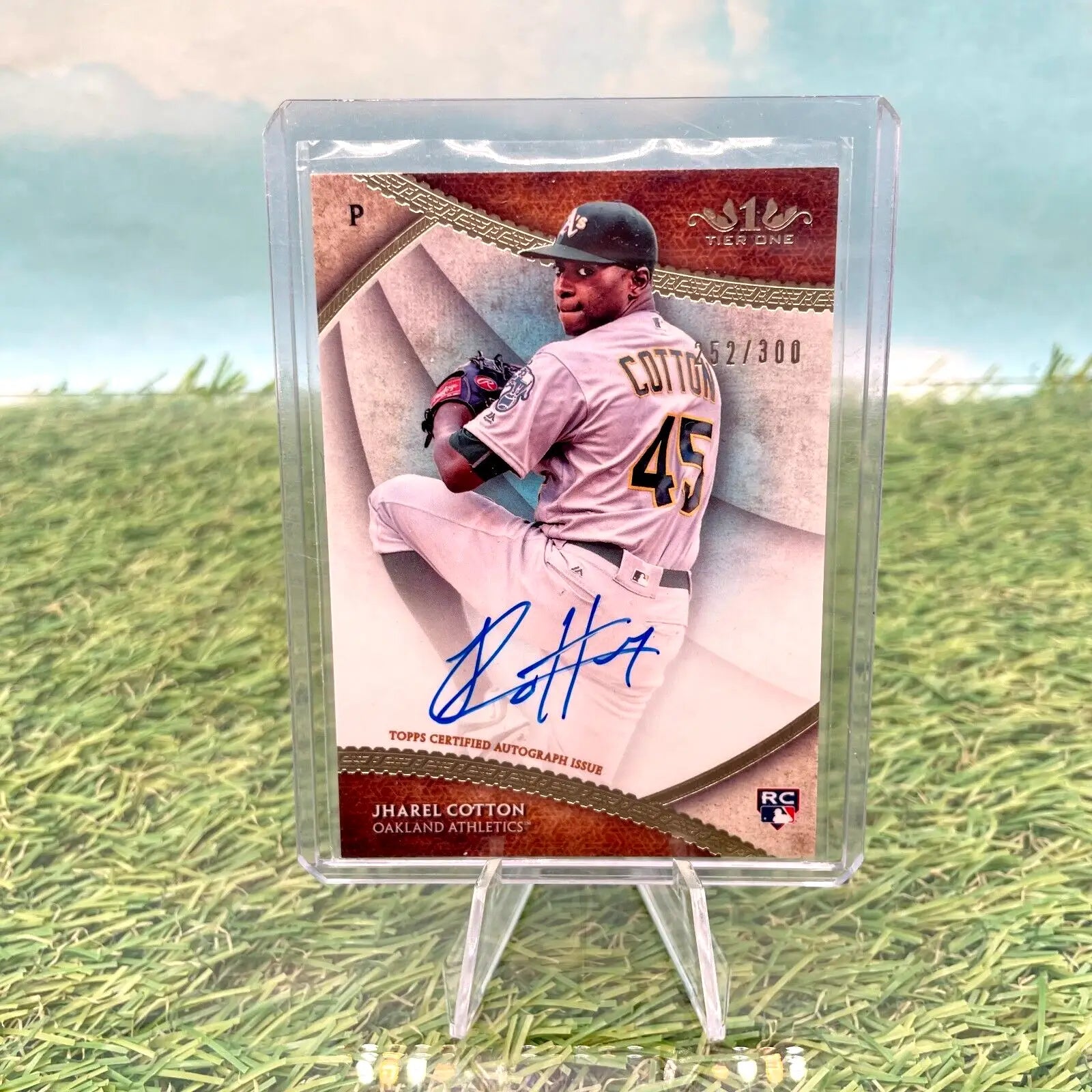 Jharel Cotton autographed baseball card from 2017 Topps Tier One Cotton Rookie Auto RC