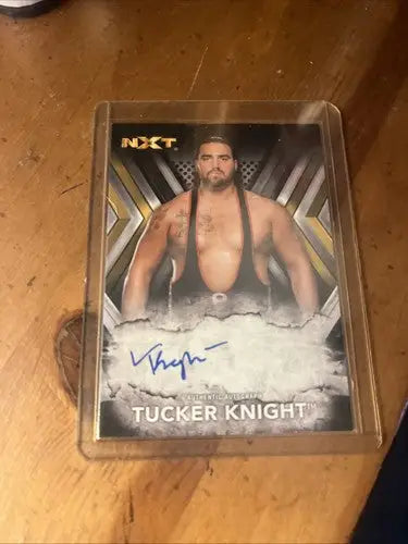 Signed Tucker Knight wrestling card from 2017 Topps WWE NXT Autographs series