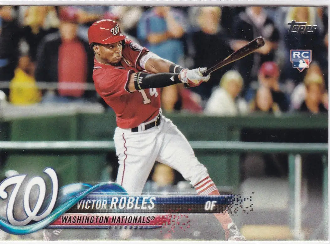 Victor Robles swinging bat in red Washington Nationals uniform for 2018 Topps RC